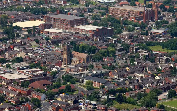 Atherton 4 Aerial view of Atherton, Manchester showing residential area, church, and town centre buildings
