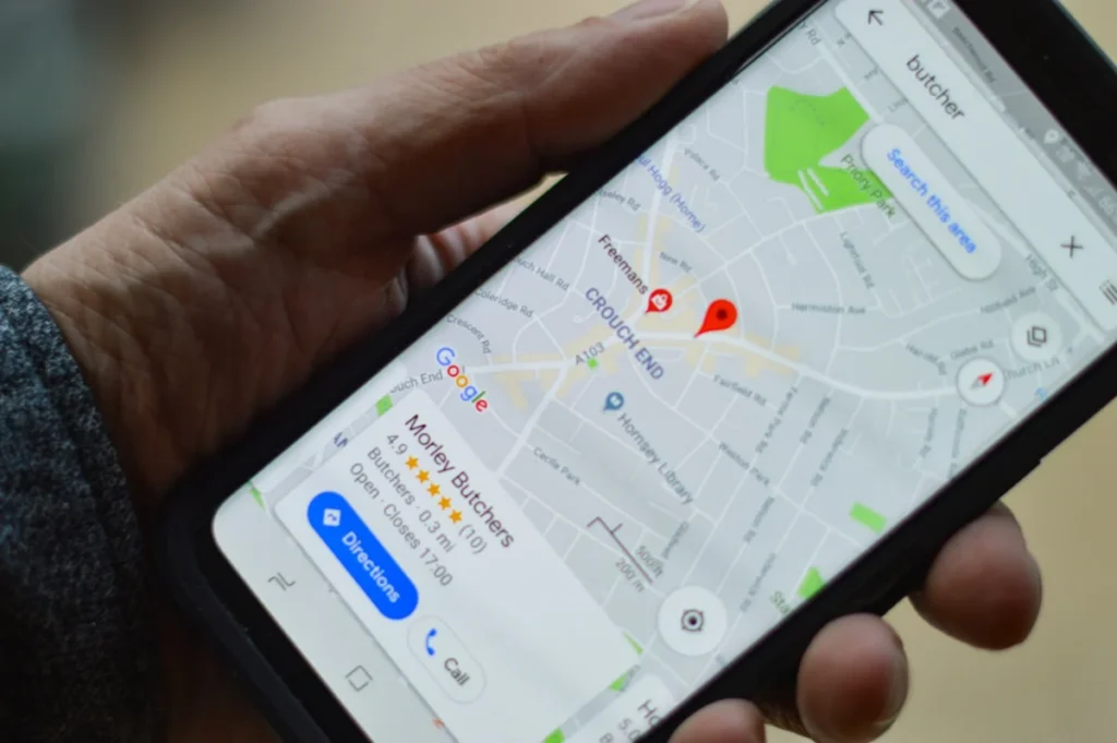 Seo vs google ads: which is better for a small business? 2 Google Maps local results on a phone, where local SEO and Google Ads compete for nearby customers