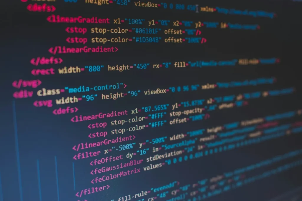 Lines of HTML code on a monitor, the front-end layer a web developer builds